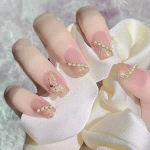 Luxury nail art using Shell Thread Gel and rhinestones