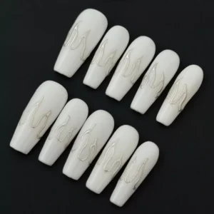 Glossy white press-on nails with 3D silver metallic flame outline – frontal view of full set