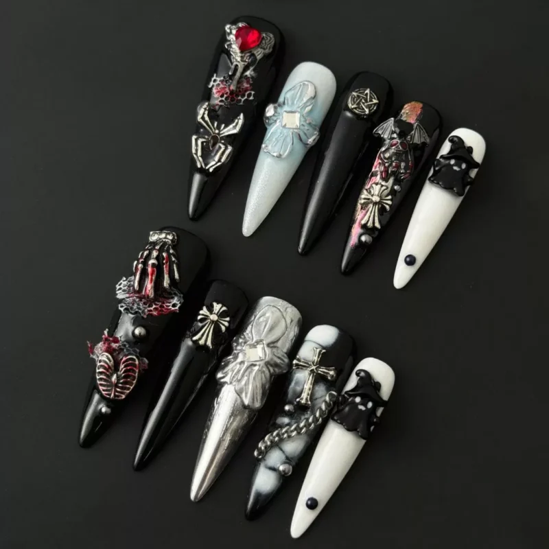 Gothic Mixed Charm Press-On Nails with skeleton and silver cross details – front angle view