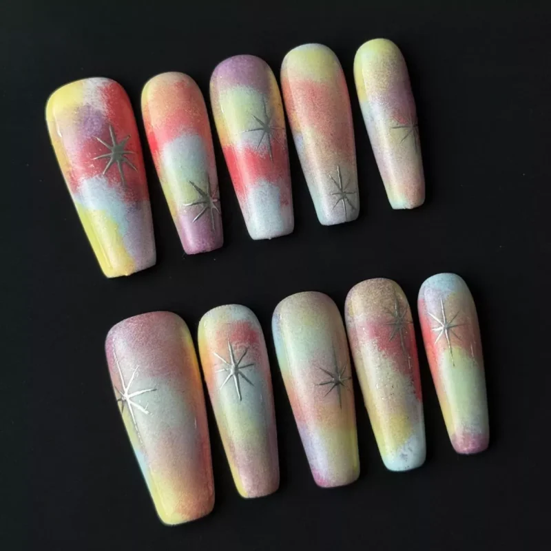 Side view of gradient glow nail art on almond-shaped press-ons