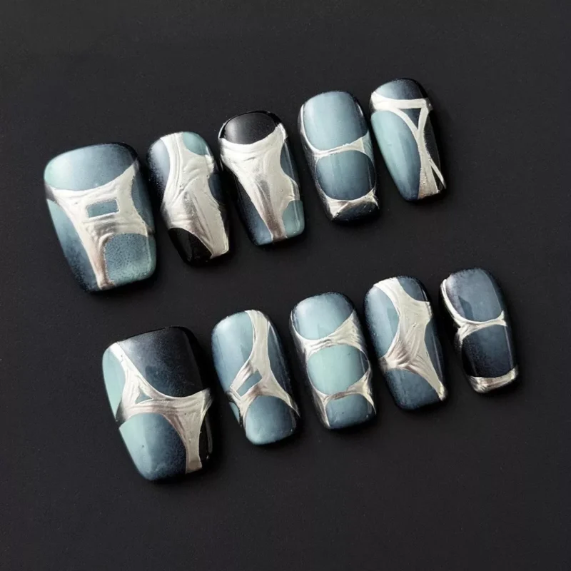 Short gray blue futuristic press-on nails with tech-inspired embossed elements