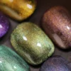 Macro shot of Cat Eye Gel showing golden-green shimmer with dense magnetic pigment