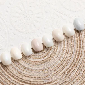Cream gel polish pastel shades arranged aesthetically in a light-toned background