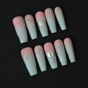 Side angle showing length and coffin shape of gradient matte press-on nails
