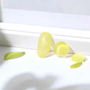 Artistic nail art using multiple green gel shades in abstract pattern