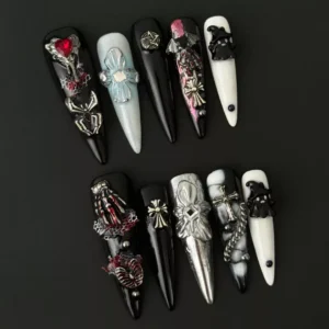 Halloween Gothic Press-On Nails with occult symbols, bat wings, and rhinestone accents