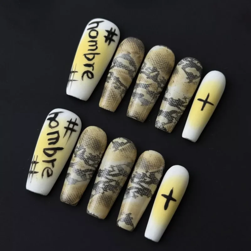 Ombre snake press-on nails with yellow graffiti and bold symbol detail – full set display