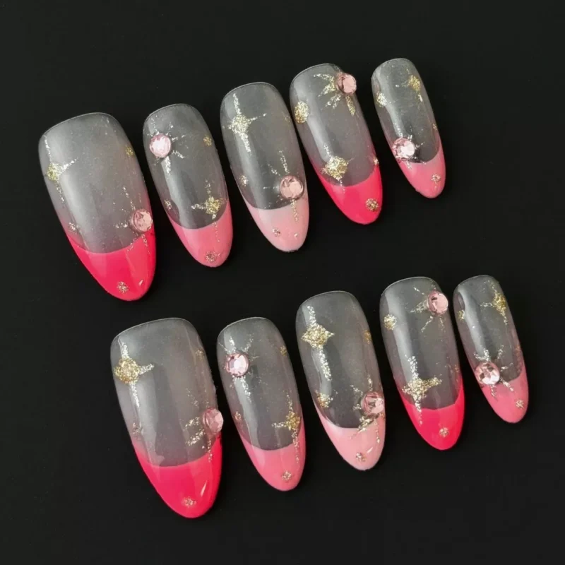 Elegant pink gold press-on nails with mixed French tip and gem accents