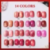 14 red cat eye magnetic gel polish swatches displayed in color chart layout