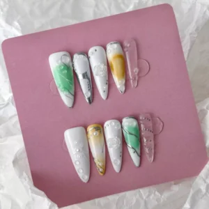 Romantic gradient French nails with 3D rose and pearl details – styled set