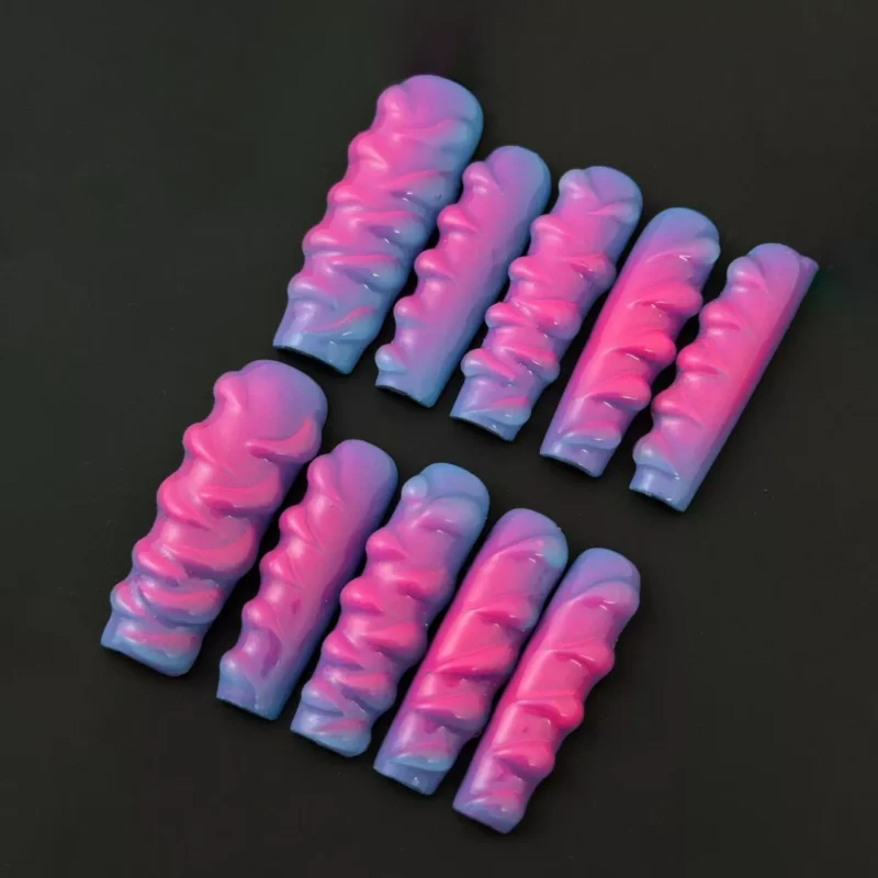 Sculpted Wave Press-On Nails with pink and blue swirl texture on glossy finish – front view