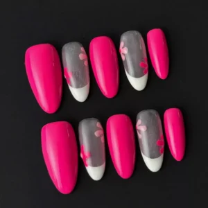 Side view of mixed hot pink press-on nails with white French tip and glossy finish