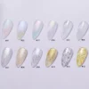 Sparkly Top Coat with dazzling gold and silver foil flakes under soft lighting