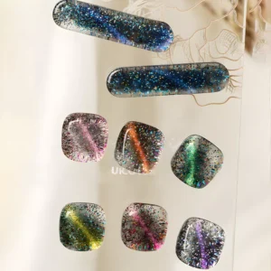 Full hand view wearing purple and navy magnetic cat eye gel polish