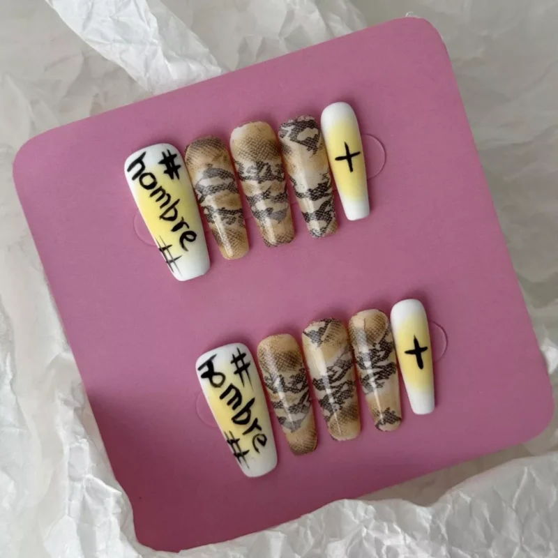 Symbolic street art design on yellow snake print press-on nails, matte finish