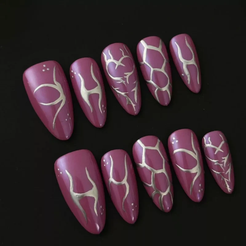 Purple coffin press-on nails with silver line art and tech-inspired pattern details