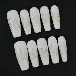 Side angle showing white chrome flame press-on nails with high-gloss finish