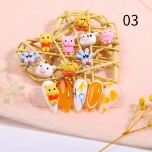 Pooh and friends nail charms in pastel tones with character nails