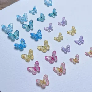 Gradient blue and pastel resin butterfly nail decorations