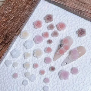 Pastel resin 3D flower nail charms in rose gradient shades