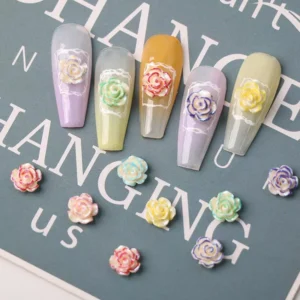 Assorted Dreamy 3D Rose Nail Charms arranged on nail swatches with layered flower design