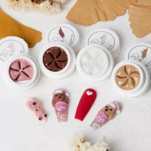 Open 3D Nail Art Gel jars with sculpted bear and heart nail tips