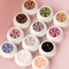 12 colors of 3D Nail Art Gel in swirl-pattern jars for sculpted nail art