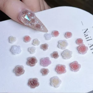 Transparent base nail design with layered resin flower and gem accents