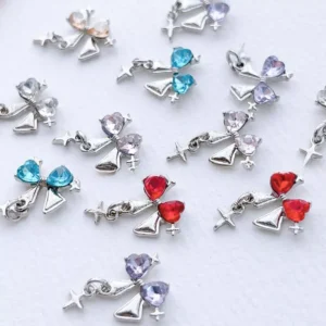 3D rhinestone nail decorations with hanging cross and heart gem
