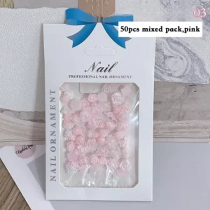 50-piece pink resin rose nail charms in gift-ready packaging