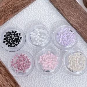 Full color set of Pearl Bow Nail Charms in 6 pastel and neutral shades