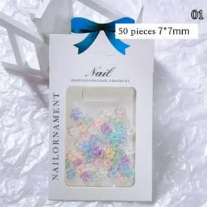 Boxed resin flower nail charms, mix of 7mm pastel iridescent blooms