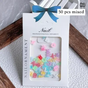 Nail ornament pack with multicolor alphabet letter nail charms, labeled 03