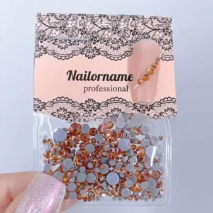Deep amber brown nail art gems in assorted sizes