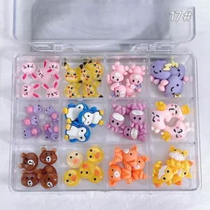 Anime-Inspired Cartoon Nail Charms arranged in a grid display case with assorted colorful resin pieces