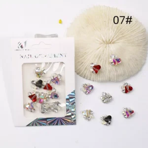 Mixed set of 3D heart nail charms in various colors and finishes