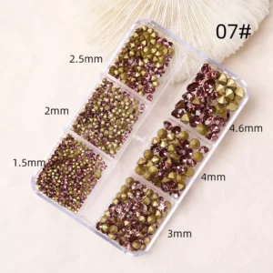 Pink rhinestone nail decoration gems in assorted sizes
