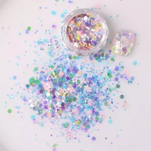 Purple, pink, and green glitter with floral sequins for fantasy nail art