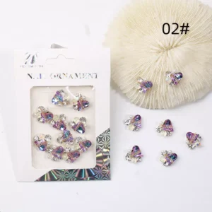 Purple and blue iridescent heart nail charms with gold