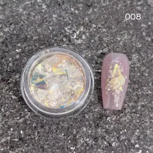 Yellow-tinted chrome nail sequins with reflective holographic opal shards