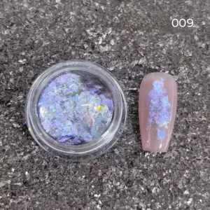 Ocean blue aurora nail sequins with holographic shift on nude base