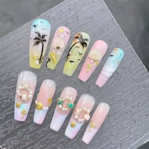 Complete summer nail set with Alloy Seashell Nail Charms and ocean-inspired detailing