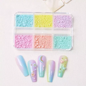 Macaron bead box in bright pastel tones with applied bead nail art below
