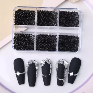 Black glossy pearl nail beads with matte black nail art design