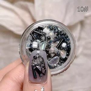Black and white nail decoration mix with pearls and beads, perfect for adding a glamorous touch