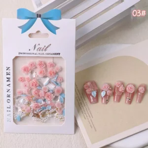Coral pink rose charms with blue foil leaves and crystal pieces