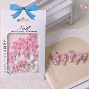 Soft pink nail decorations with 3D roses and pearl details