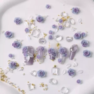 Blooming Rose Nail Charms in purple with crystal and pearl accents – top view