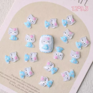 Light blue-dressed cat nail charms with glossy resin finish