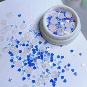 Pot of round glitter mix with blue hearts and stars